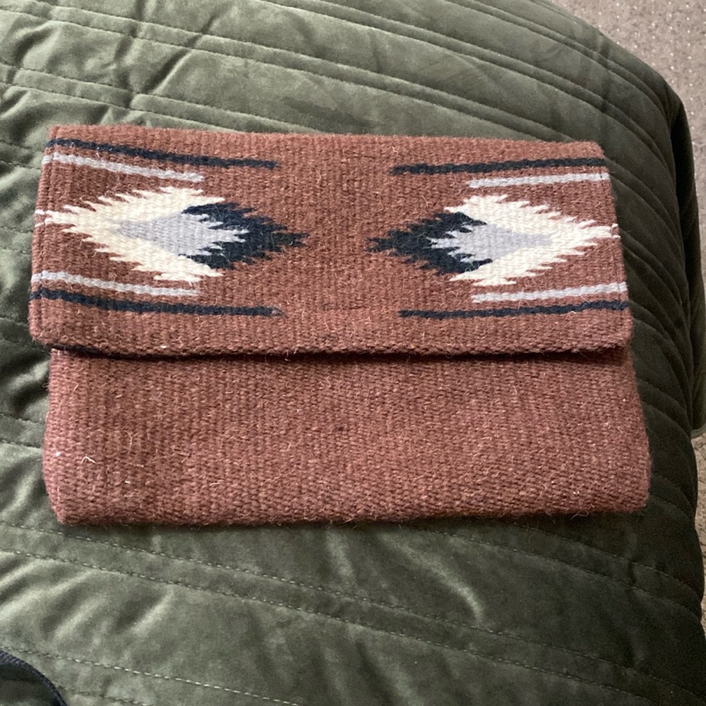 Rug bag material clutch